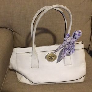 White very worn coach purse